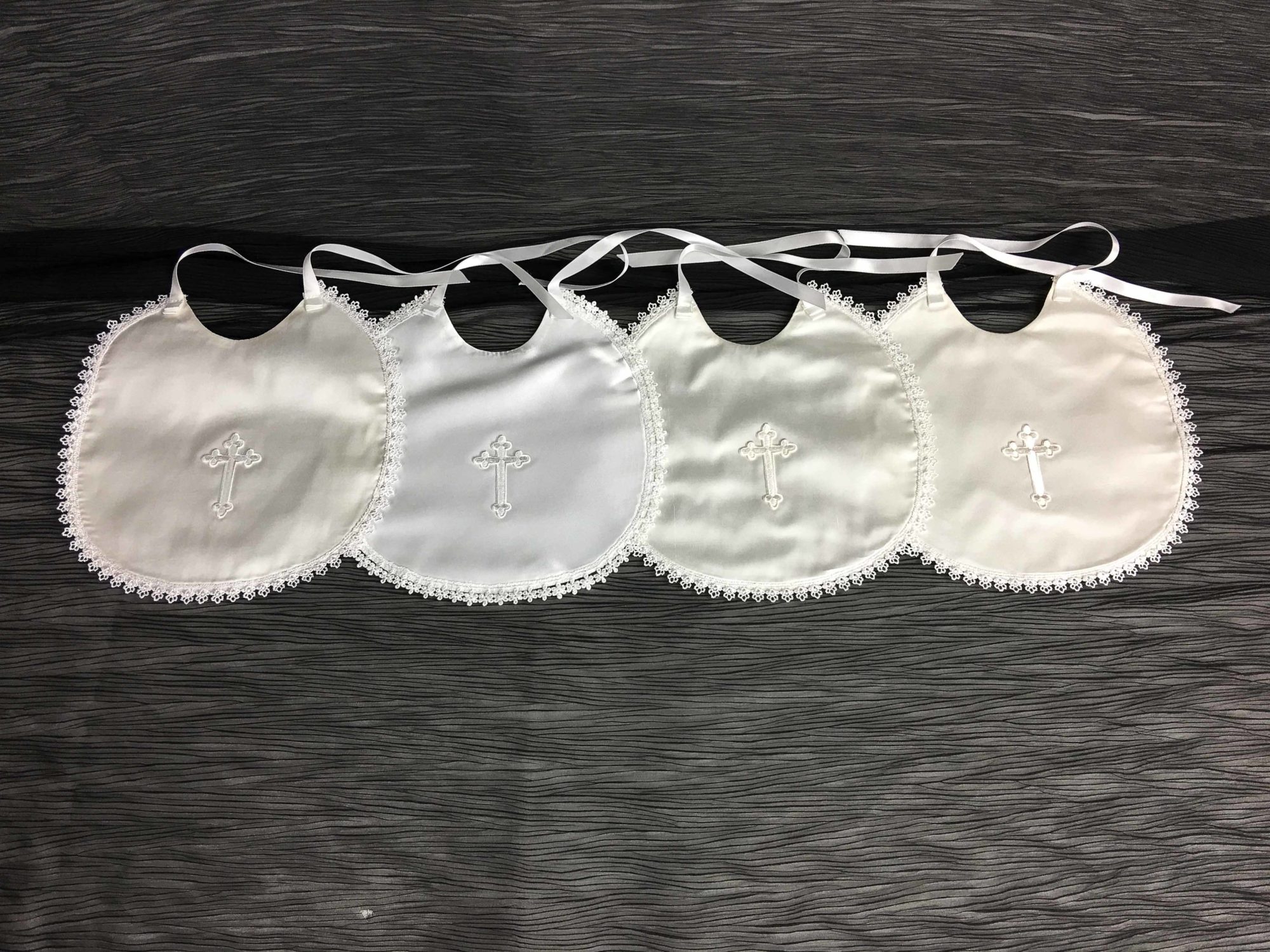 Cross Bib with Lace Edging